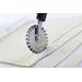 Dough cutter serrated blade
