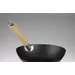Wok with wooden handle